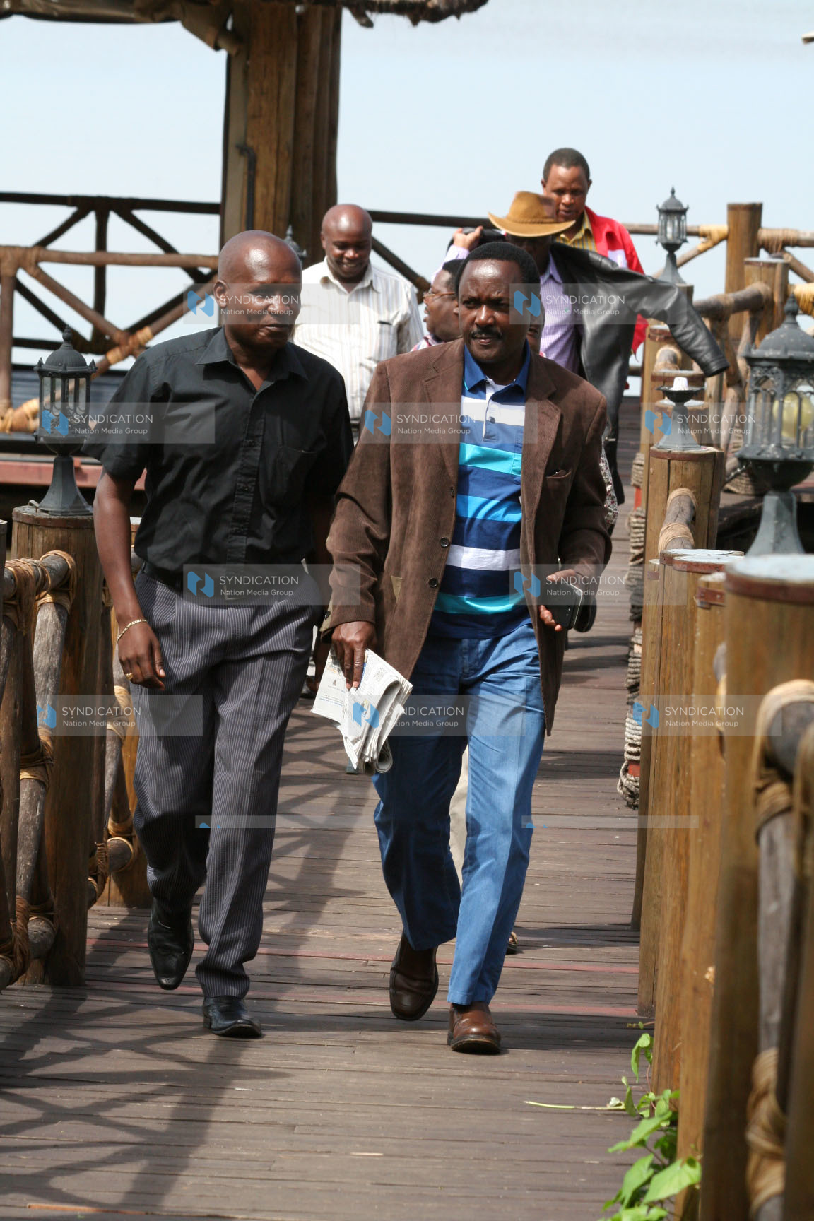 Kalonzo Musyoka (right) talks with Impala Ecolodge Group Operations Manager Martin Khaemba (left)