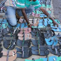 Stephen Mwangi displays his wares, commonly known as Akala shoes
