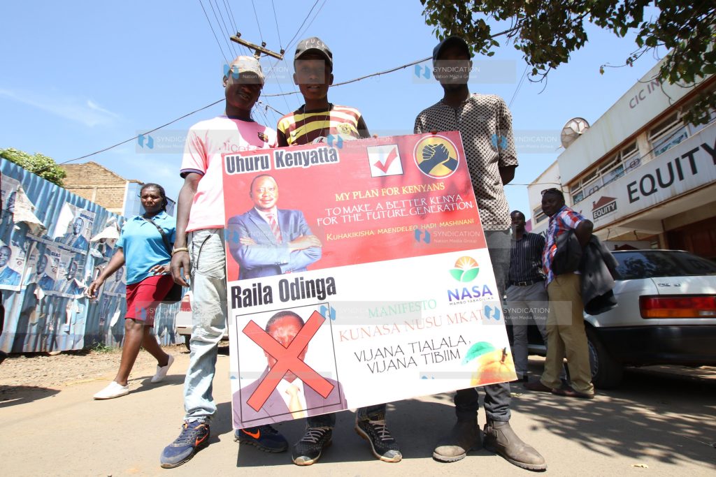 These youths walk around Meru Town