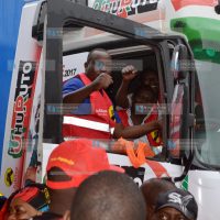 Jubilee Party supporters on a branded caravan