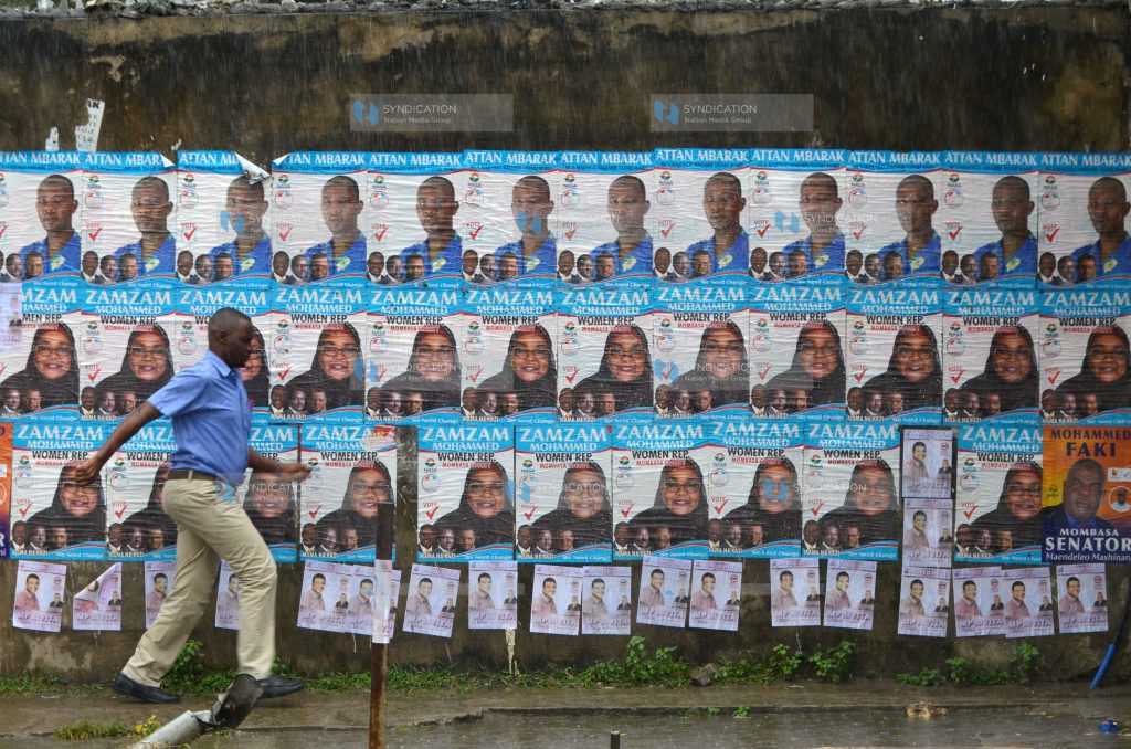 Campaign posters for various politicians