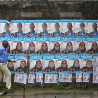 Campaign posters for various politicians