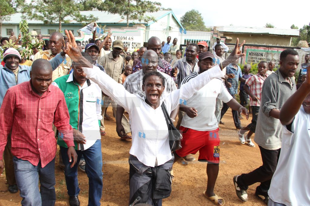 Moses Wetang’ula (partially hidden second left)