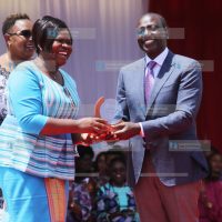 President William Ruto presents to Homa Bay Governor Gladys Wanga a Trailblazers award