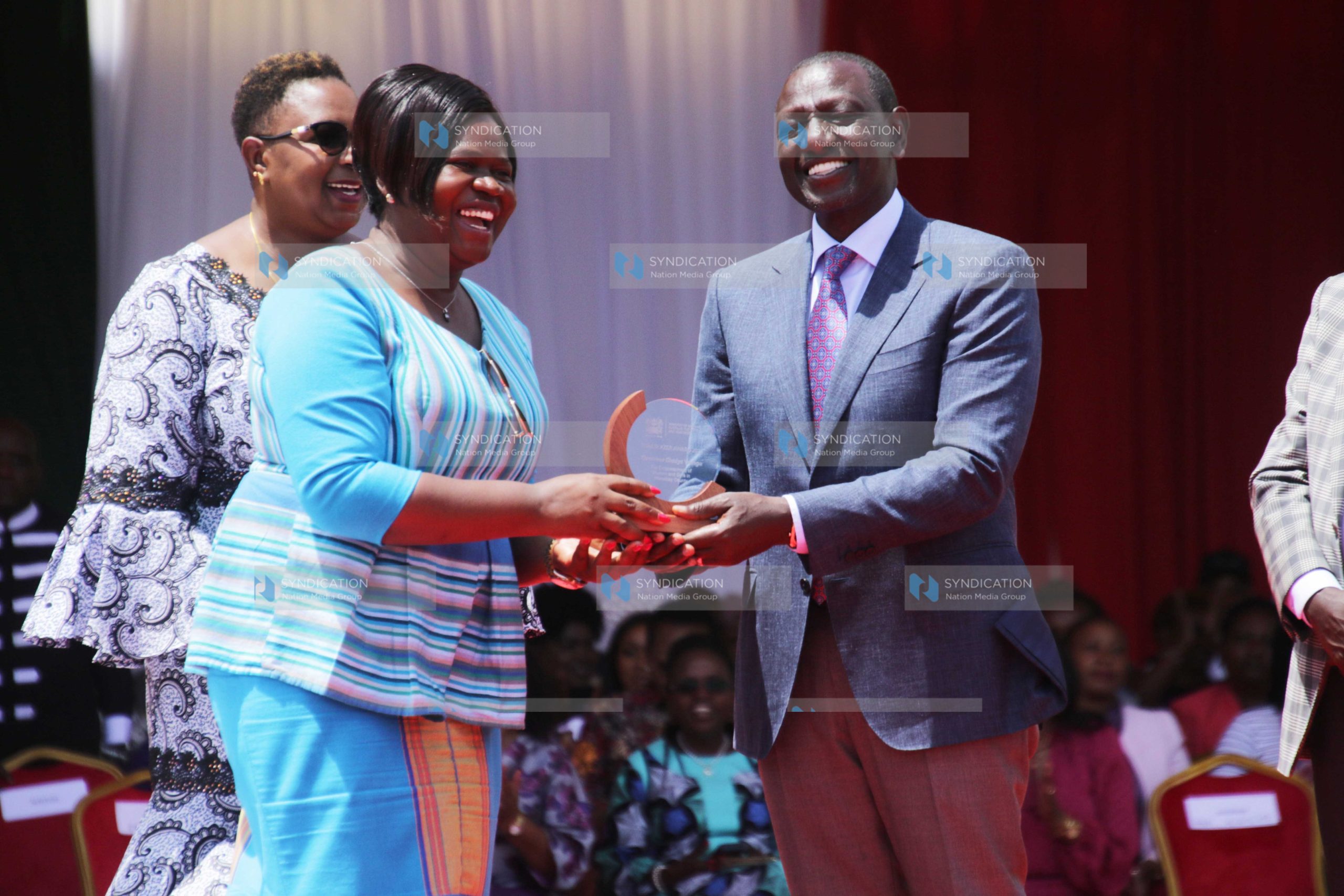 President William Ruto presents to Homa Bay Governor Gladys Wanga a Trailblazers award