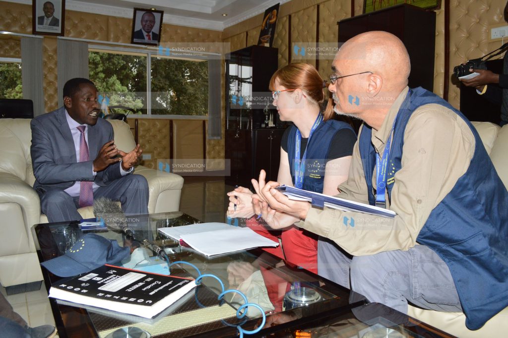 Peter Munya, Meru Governor (left), meets with European Union election observers Gabriela Skulova (center) and Domenico Castellani