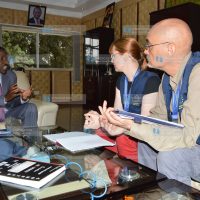 Peter Munya, Meru Governor (left), meets with European Union election observers Gabriela Skulova (center) and Domenico Castellani