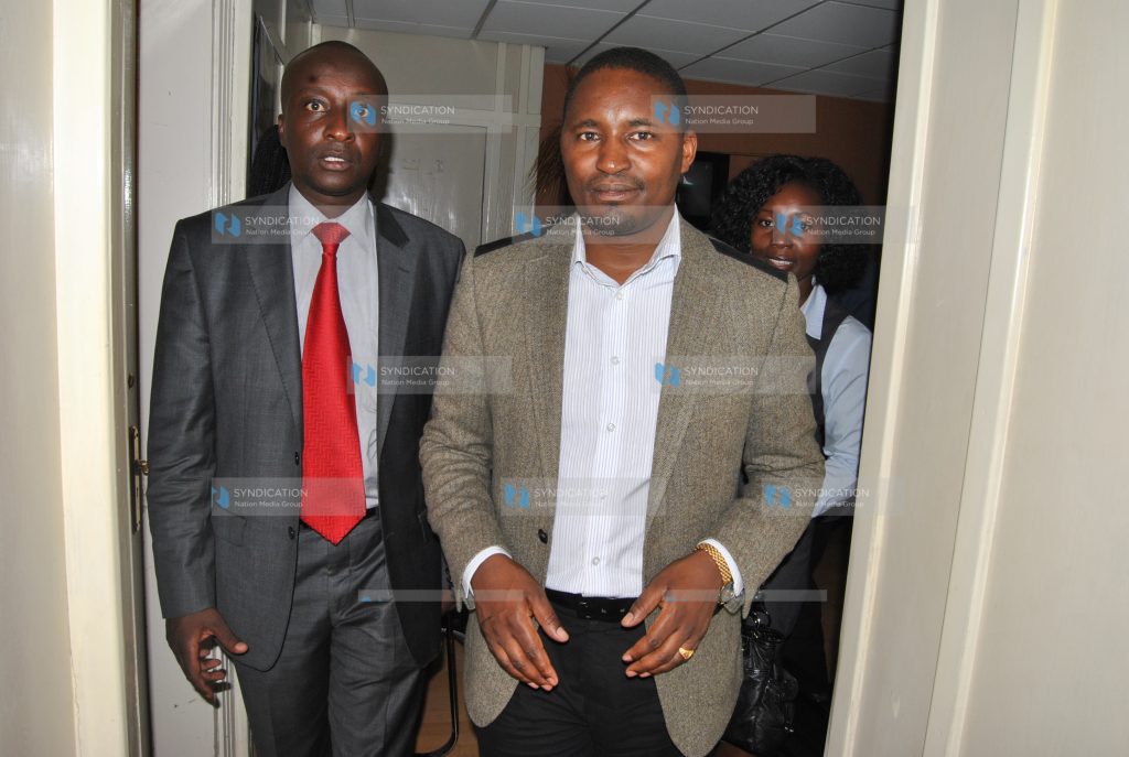 Grand National Unity (GNU) Party leader Mwangi Kiunjuri (right)