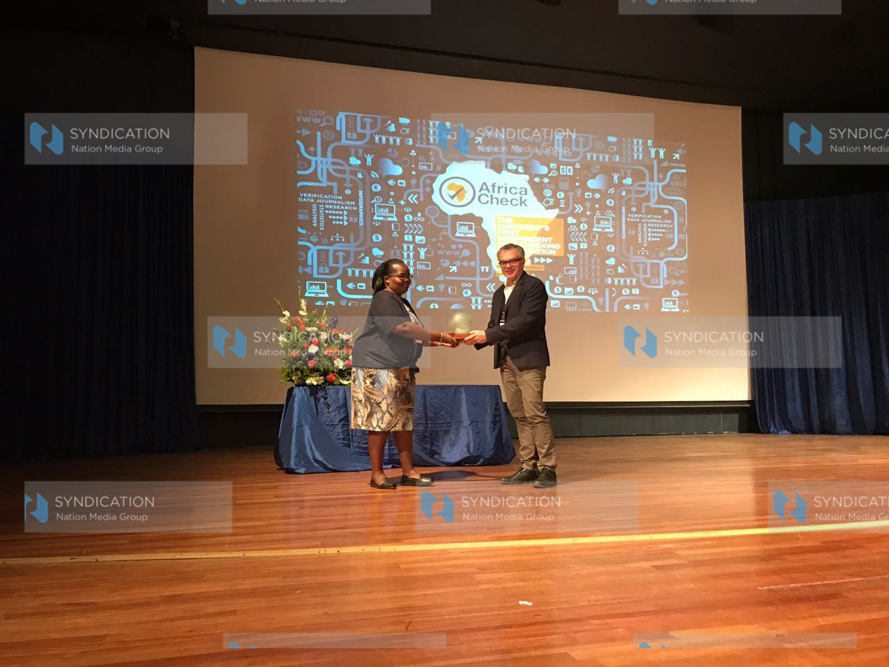 Dorothy Otieno, Data Editor, receives the Africa Fact-Checking Award for 2017 on behalf of the Nation Newsplex team