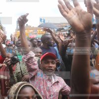 Residents of Nyeri follow proceedings during a campaign