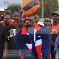 Devolution CS Mwangi Kiunjuri performs the ceremonial serving as he launched the annual Giakanja Volleyball Cup