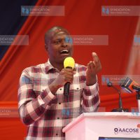 Kiharu Mp Ndindi Nyoro delivering a key note address at Tangaza University