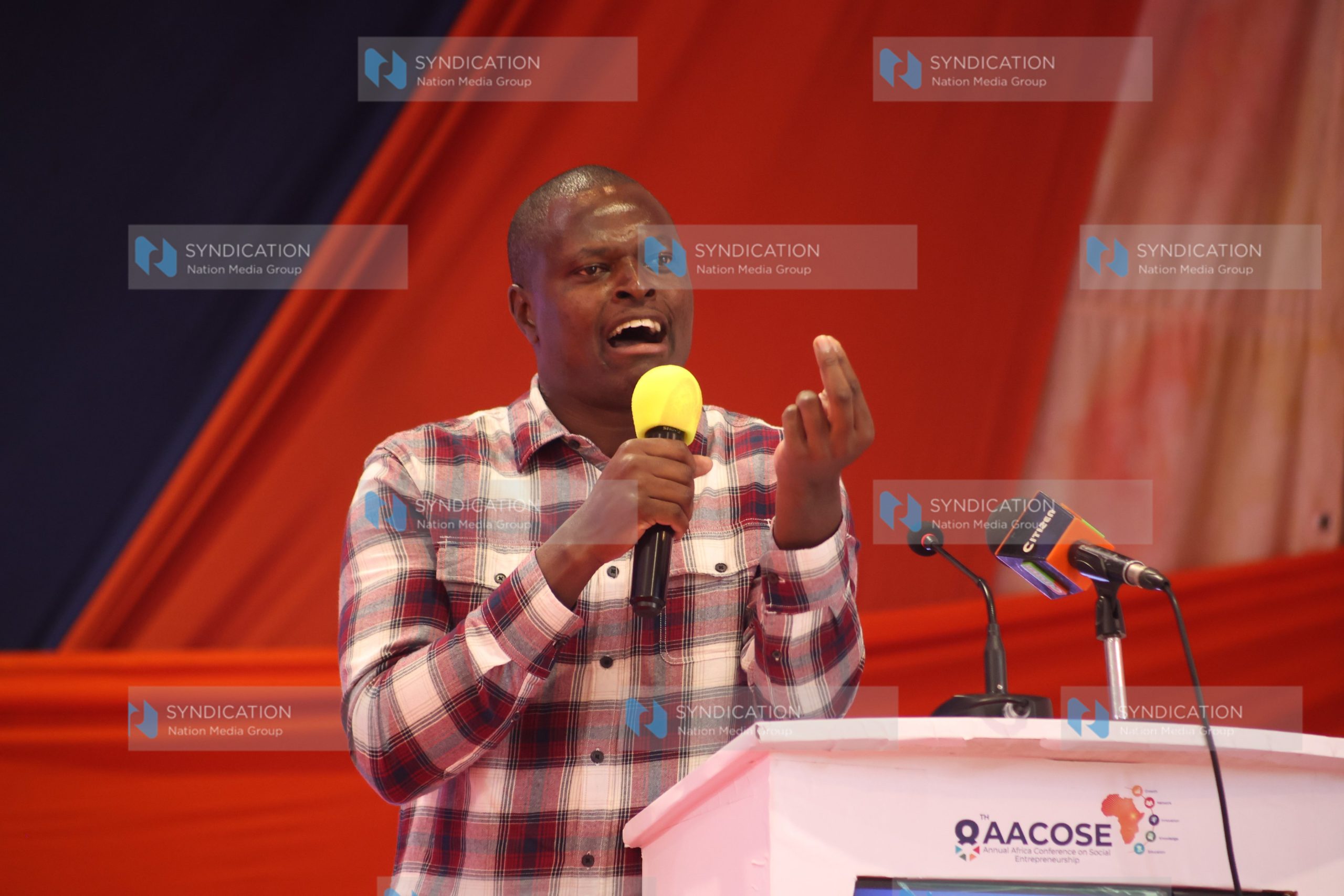 Kiharu Mp Ndindi Nyoro delivering a key note address at Tangaza University