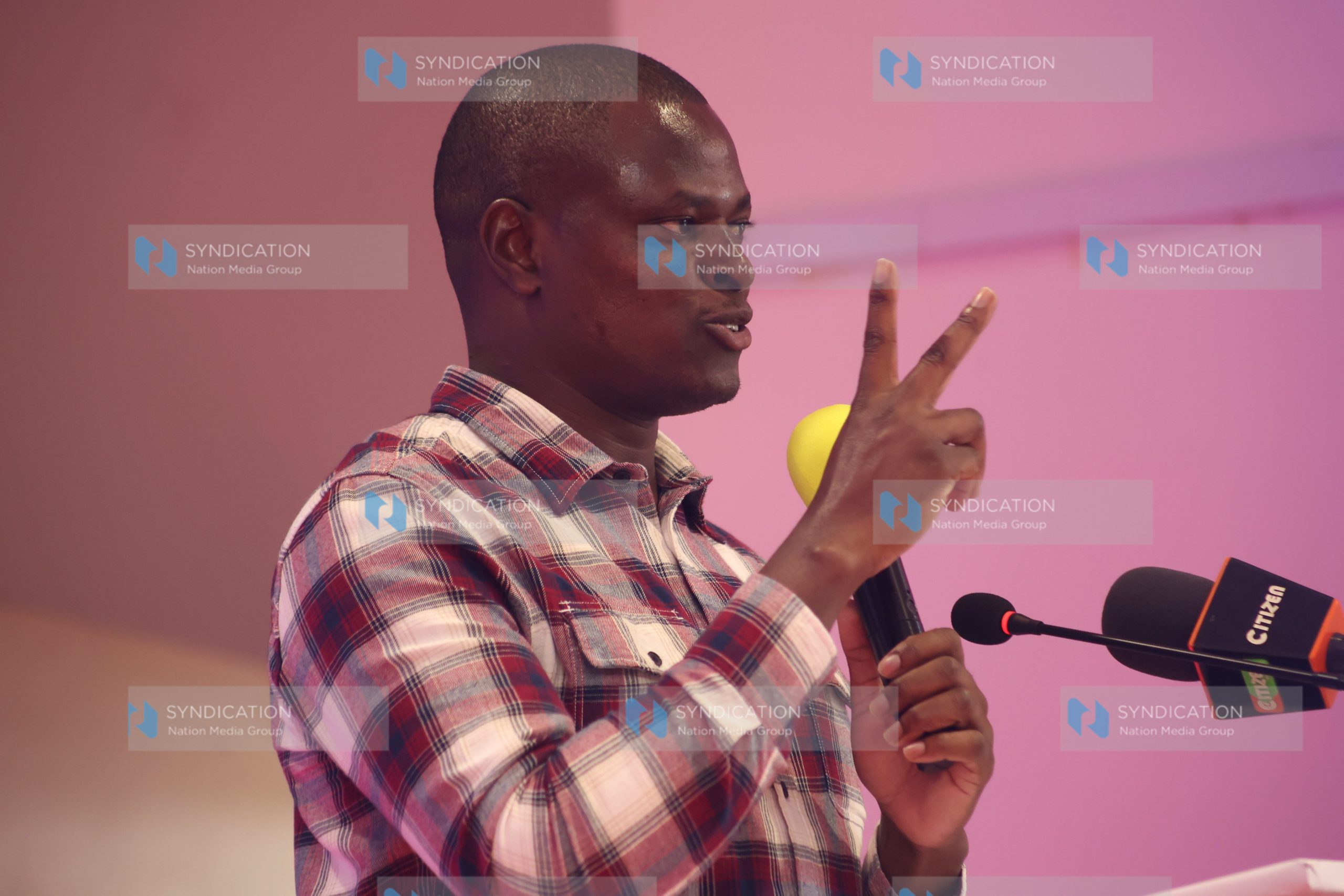 Kiharu Mp Ndindi Nyoro delivering a key note address at Tangaza University