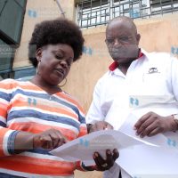 Mbita MP Millie Odhiambo with his lawyer Harun Ndubi at a Nairobi hotel