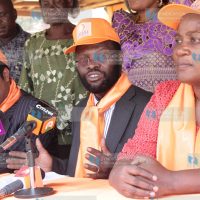Medical services Minister Anyang Nyong'o (center)