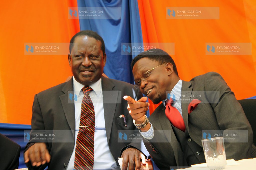 Raila Odinga (left) with Party Secretary General Ababu Namwamba