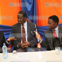 Raila Odinga (centre) with Party Secretary General Ababu Namwamba