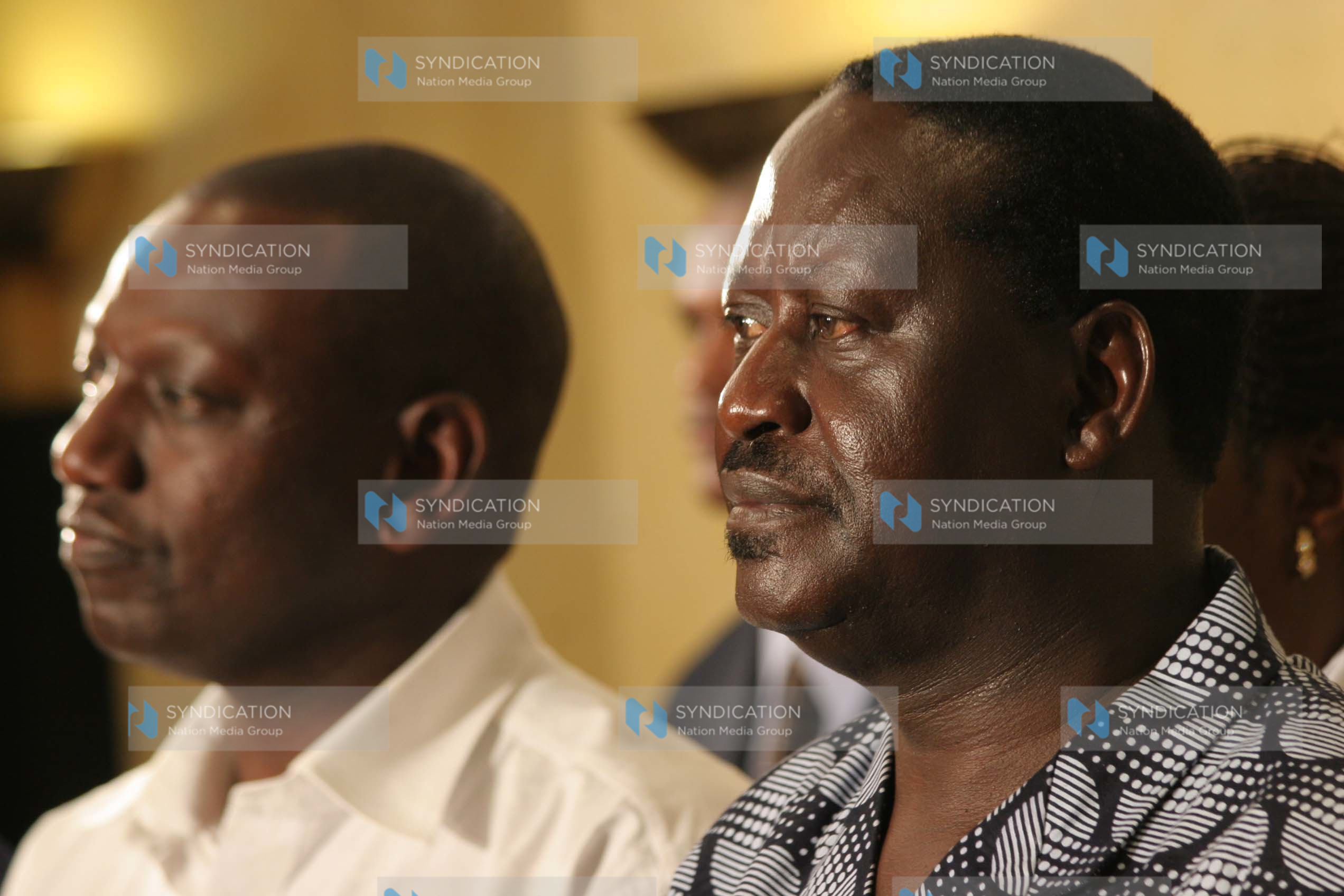 Prime Minister Raila Odinga (right) with William Ruto during a press conference
