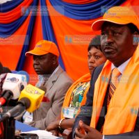 ODM party leader Raila Odinga (right), flanked by other party members