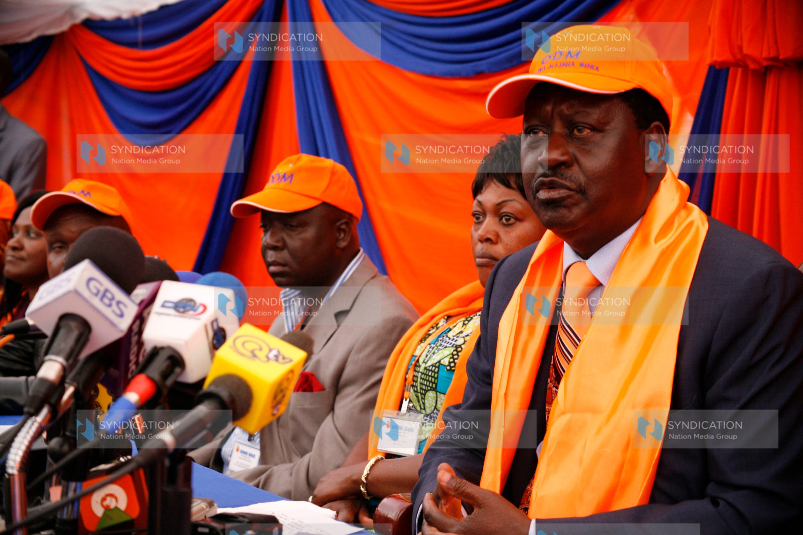 ODM party leader Raila Odinga (right), flanked by other party members