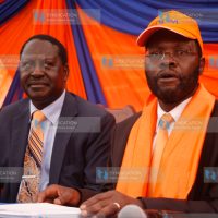 Raila Odinga (left) flanked by Kisumu senator Anyang Nyong'o
