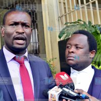 Edwin Sifuna (left) lawyer to the family of the late Kibra MP Ken Okoth addressing media