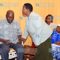 Former President Daniel arap Moi consoling Lydia Ntimama