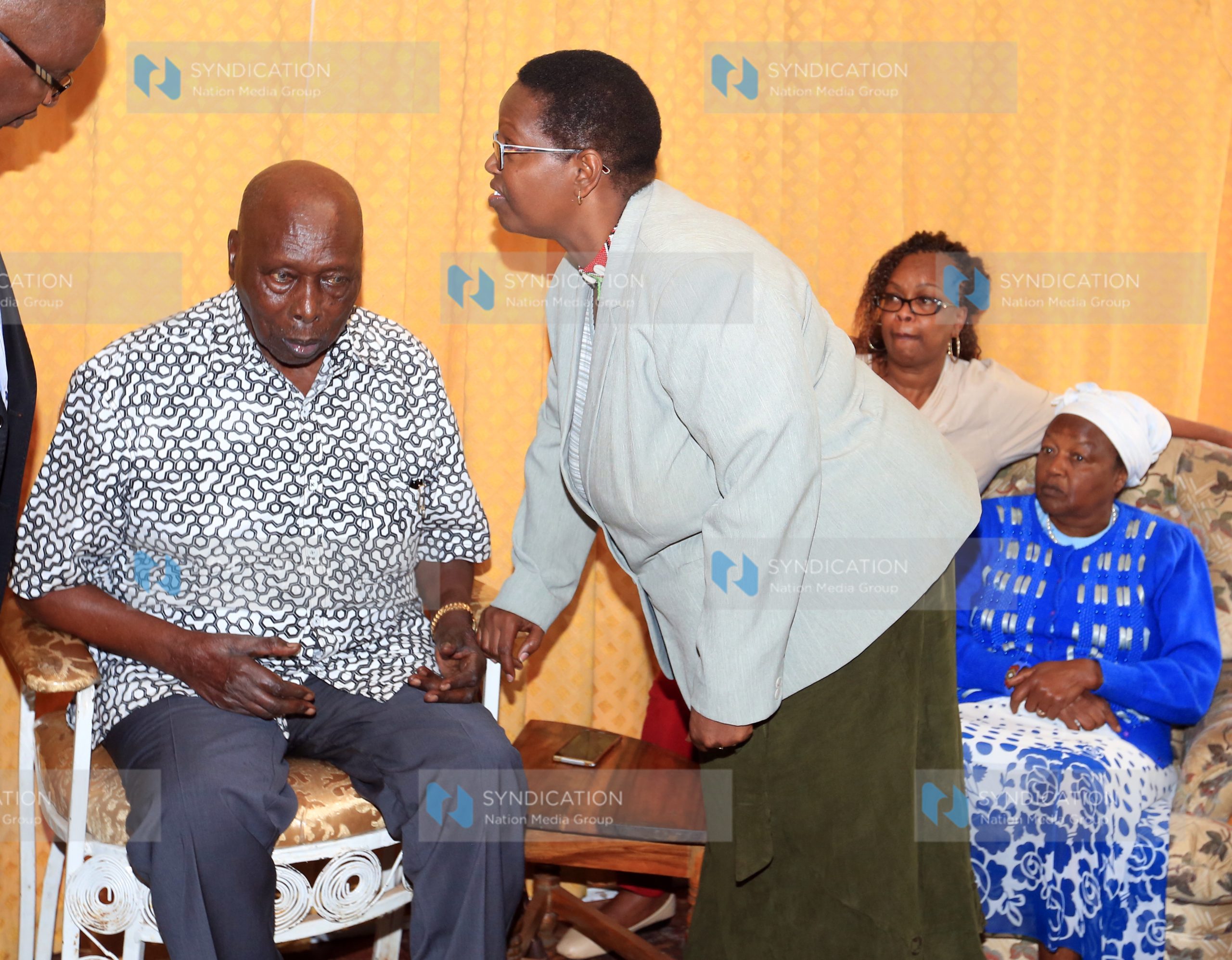 Former President Daniel arap Moi consoling Lydia Ntimama