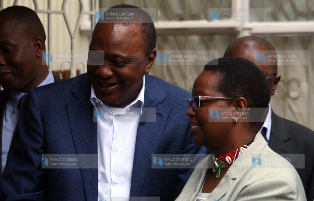 President Uhuru Kenyatta(left) with Lydia Ntimama