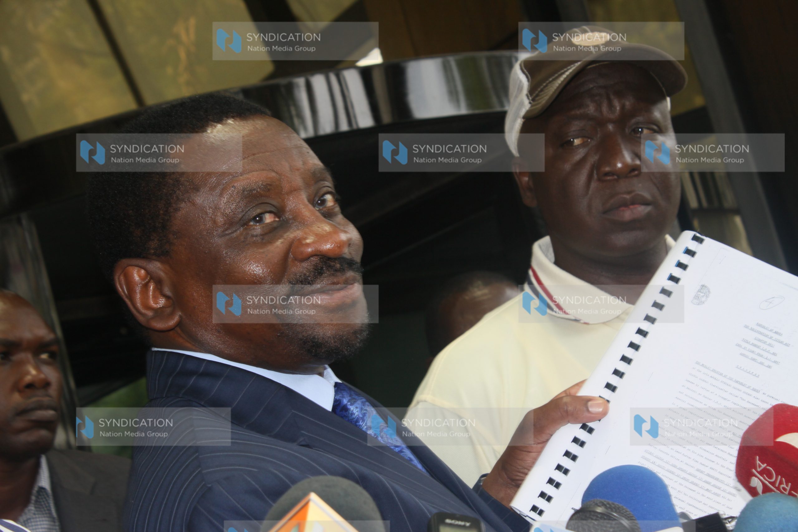 Jakoyo Midiwo (right) with Senator James Orengo