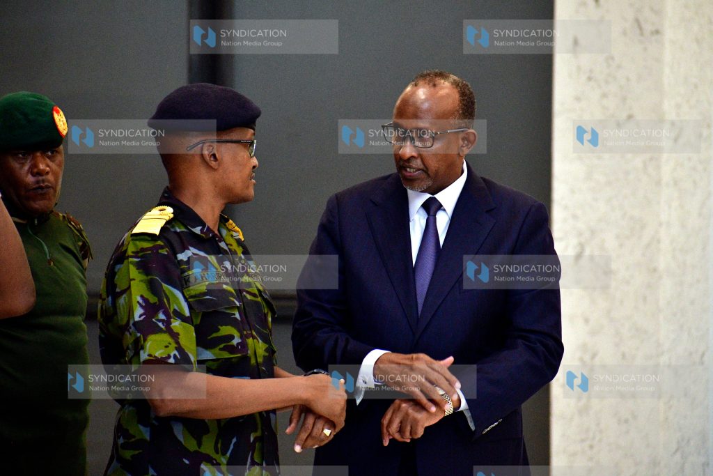 Defence Cabinet Secretary Aden Duale (right)