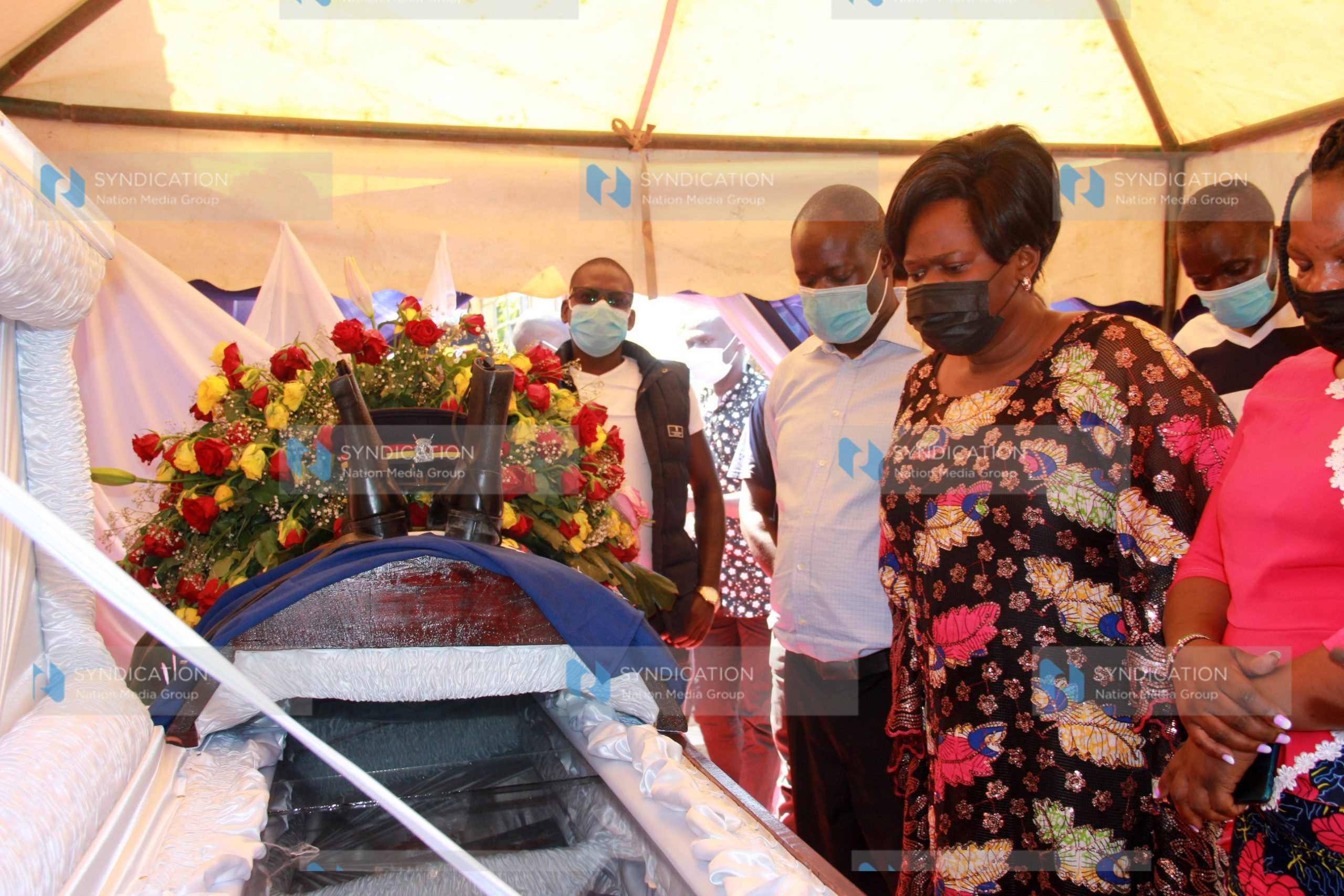 Homa Bay Woman Representative Gladys Wanga view the body of slain police Constable John Ogweno