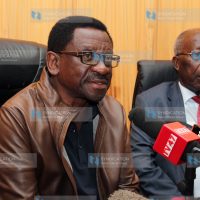 Senate Minority Leader James Orengo (left) addresses the media