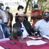 Dr. Richard Mutura (left), Njeru Kathangu (center) and Ekuru Aukot addressing journalists