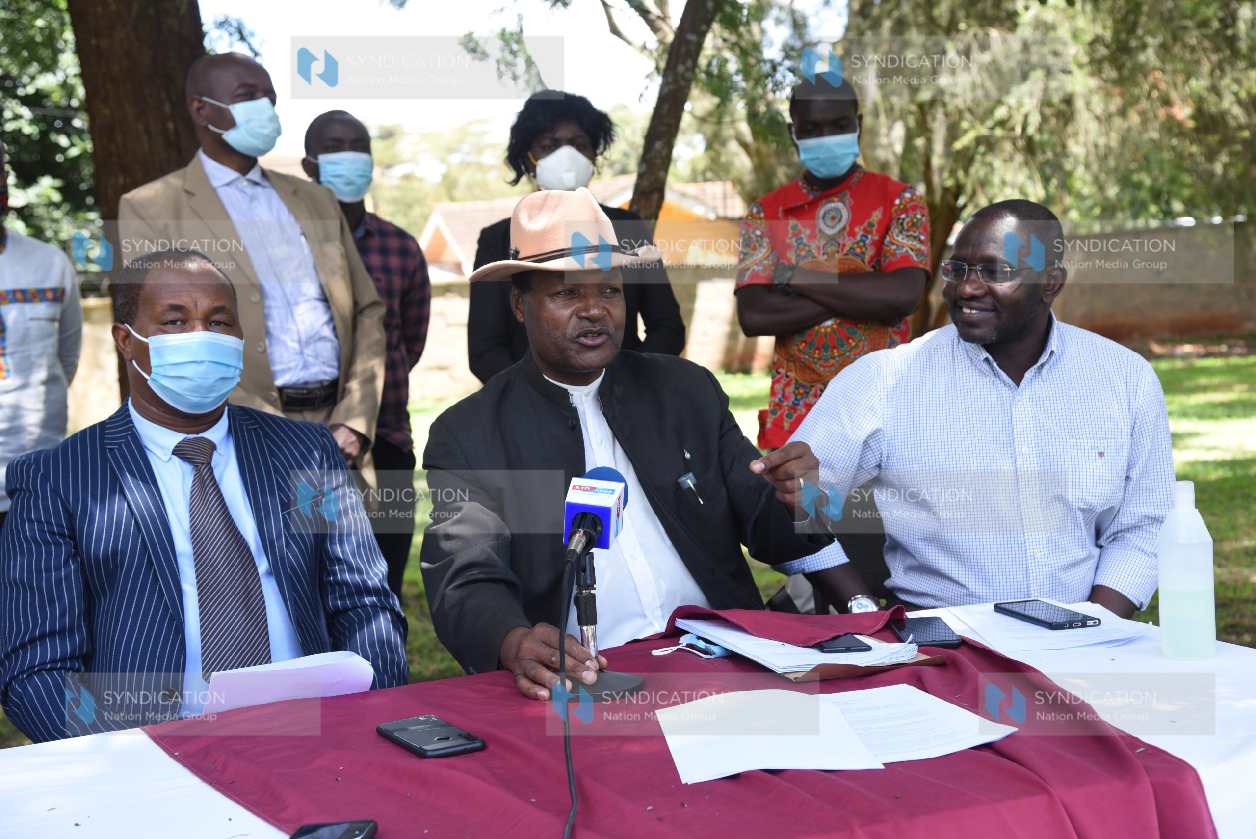 Dr. Richard Mutura (left), Njeru Kathangu (center) and Ekuru Aukot addressing journalists