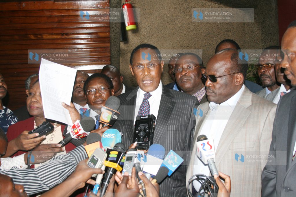 Party of National Unity Chairman Professor George Saitoti (center)