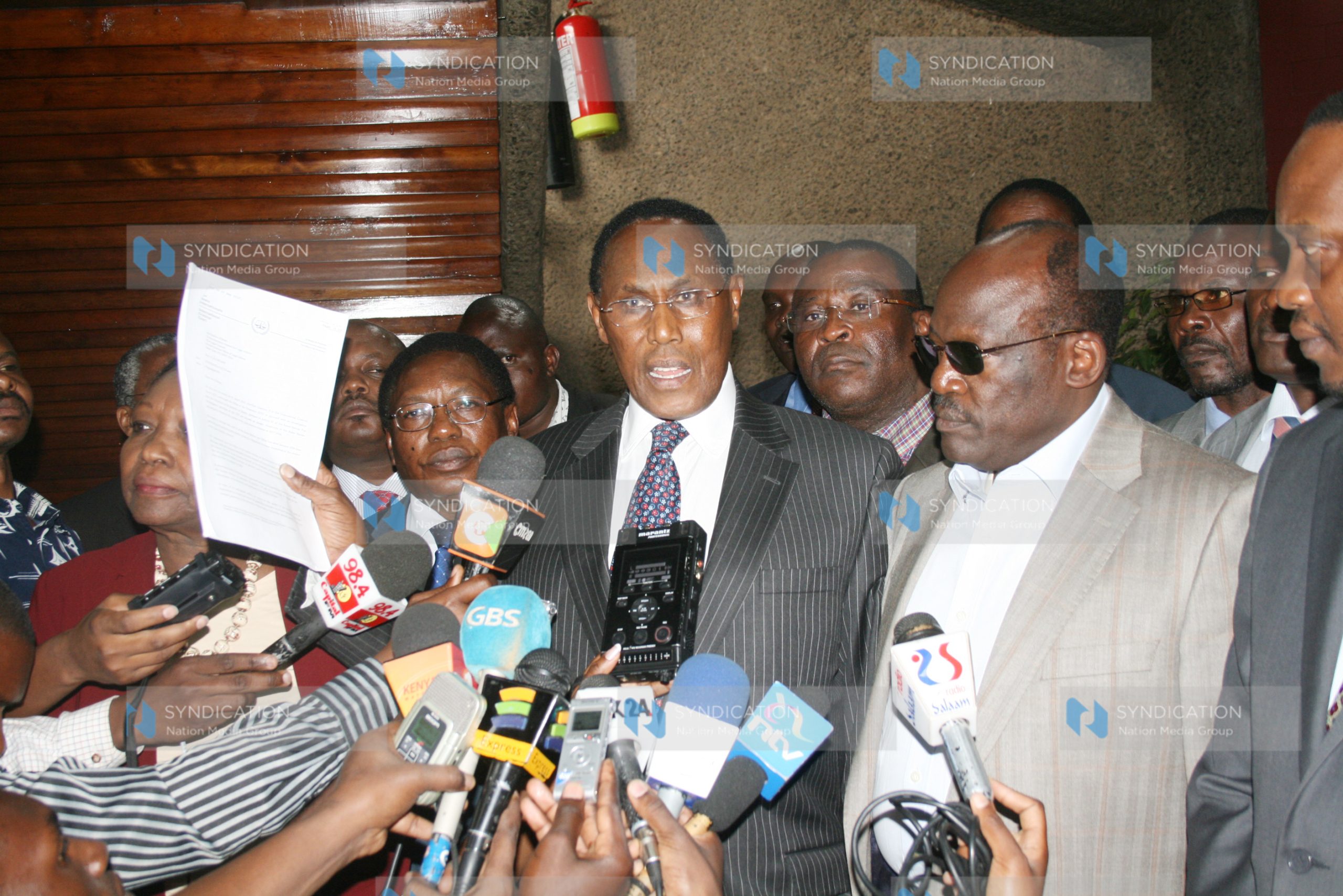 Party of National Unity Chairman Professor George Saitoti (center)