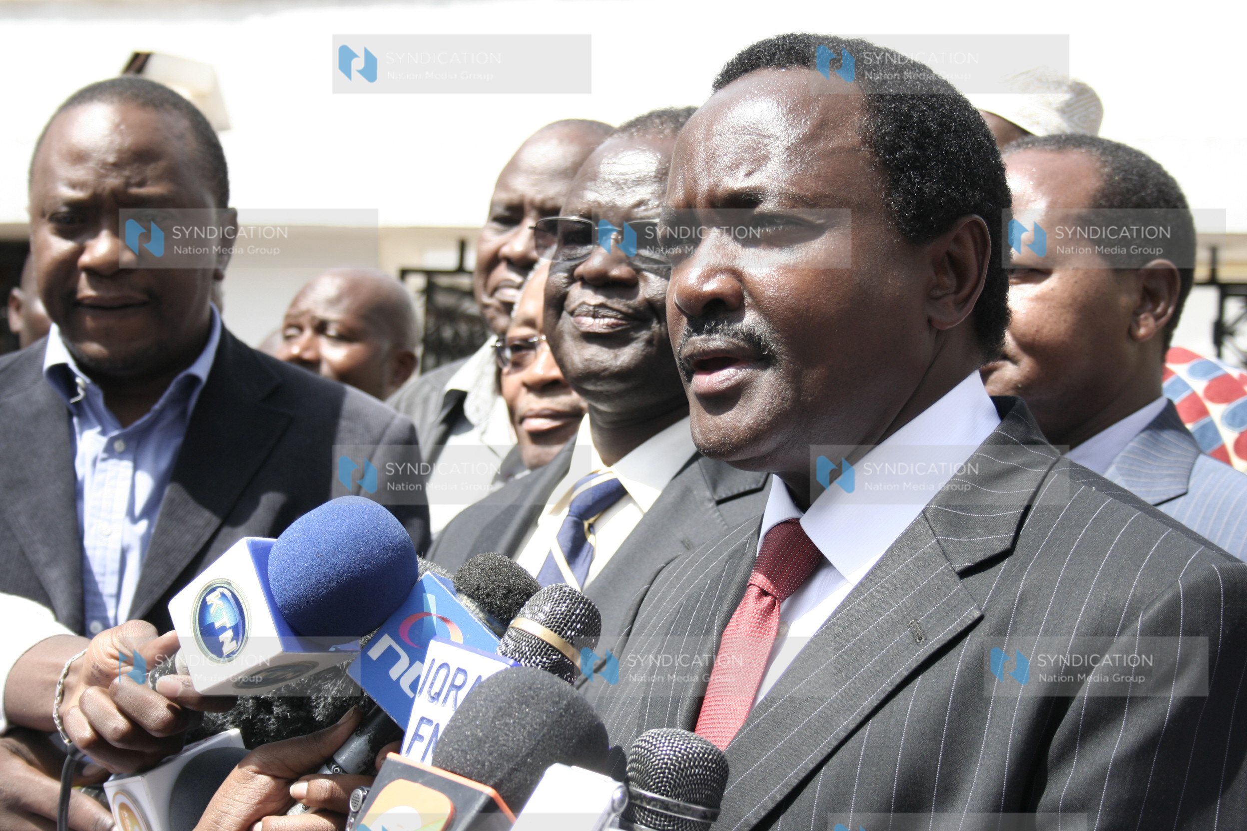 Kalonzo Musyoka, Kiraitu Murungi and Uhuru Kenyatta address journalists