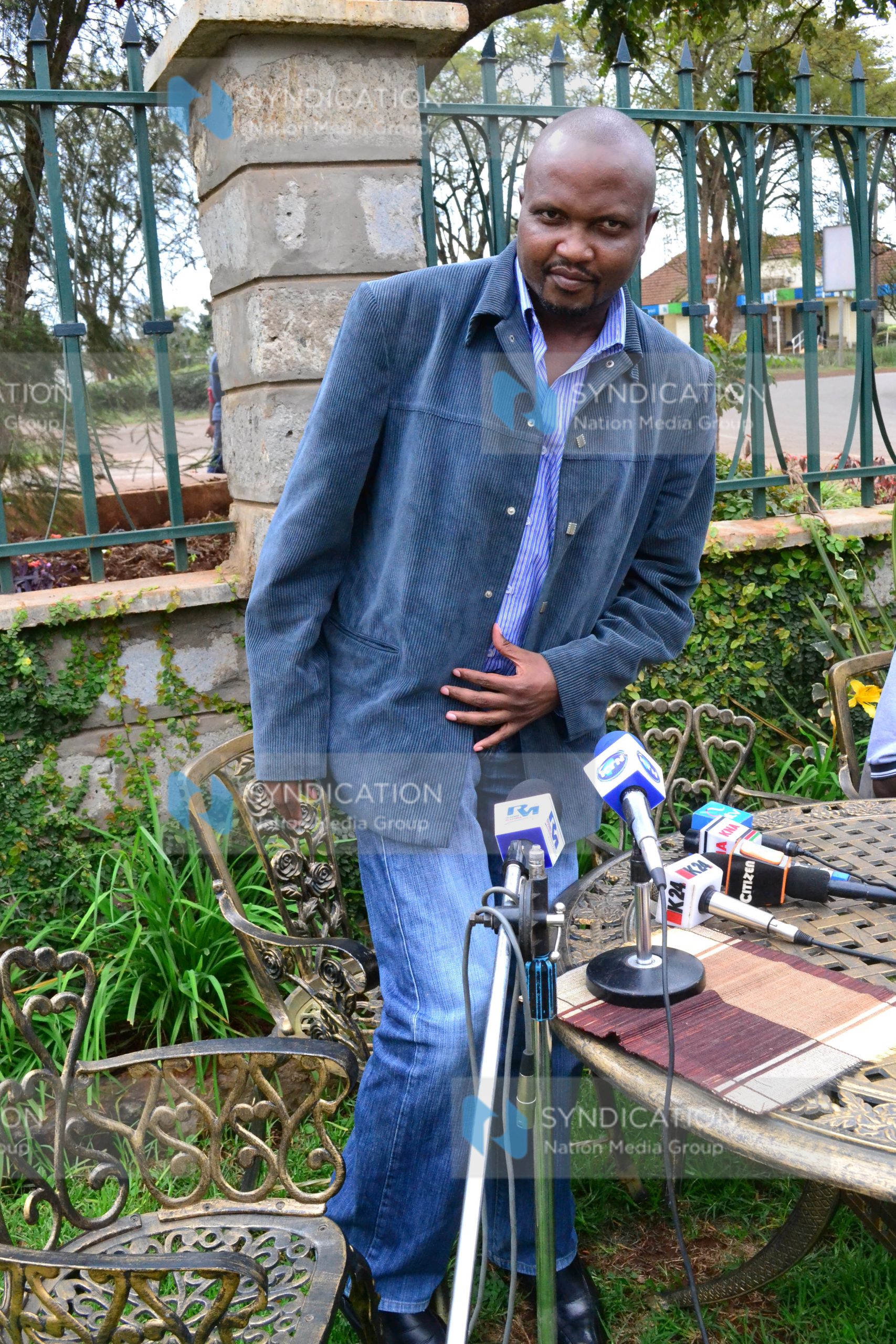Moses Kuria addresses a press conference