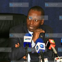 Transport minister Amos Kimunya (left) made a brief address to the media