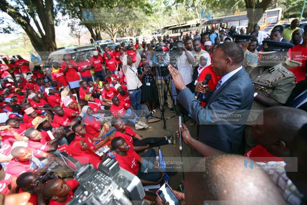 Joseph Ole Nkaissery addressing Members of Makonde Community