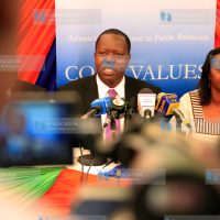 Cabinet Secretary ICT Dr. Fred Matiang'i (L) addresses journalists