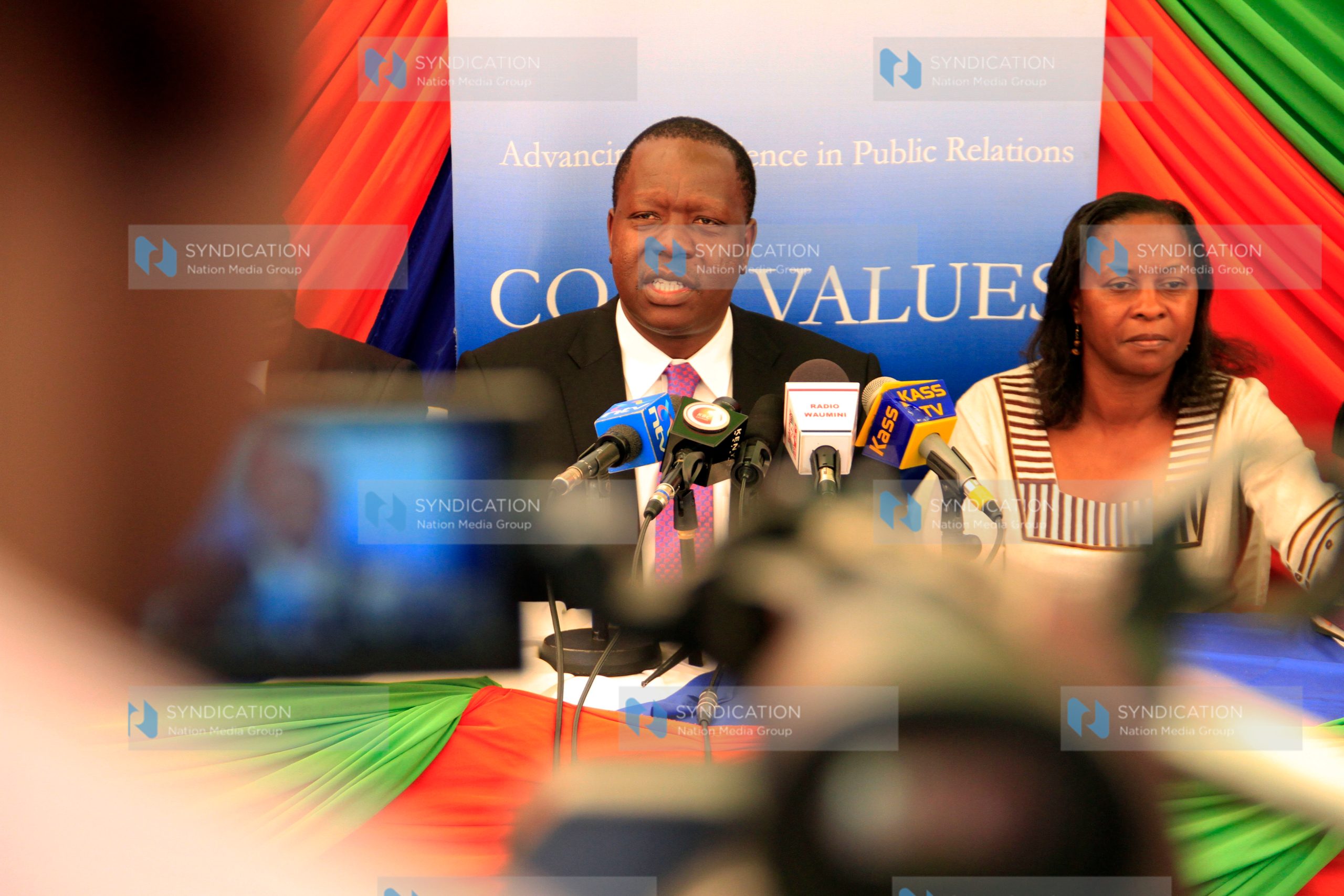 Cabinet Secretary ICT Dr. Fred Matiang’i (L) addresses journalists