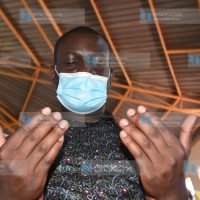 ODM Secretary General Edwin Sifuna praying at Soweto Catholic Church