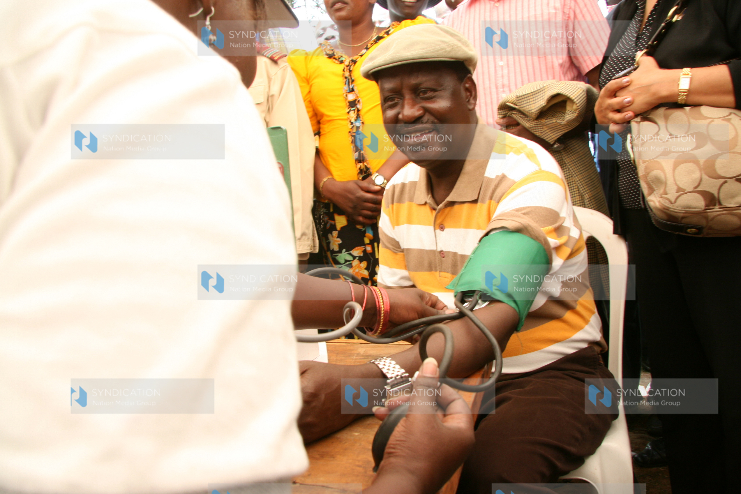 Prime Minister Raila Odinga is checked for blood pressure