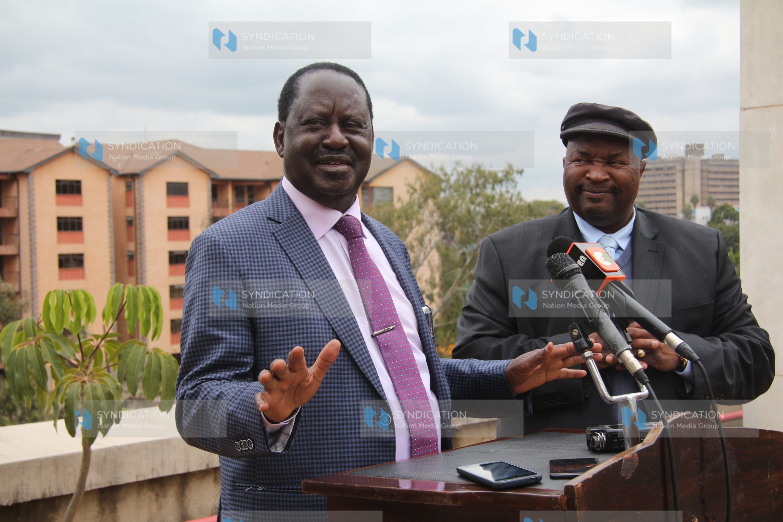 Raila Odinga with South African football investor Jomo Sono