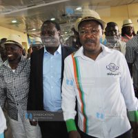 Raila Odinga (centre) with Moses Wetangula (right) and Ababu Namwamba