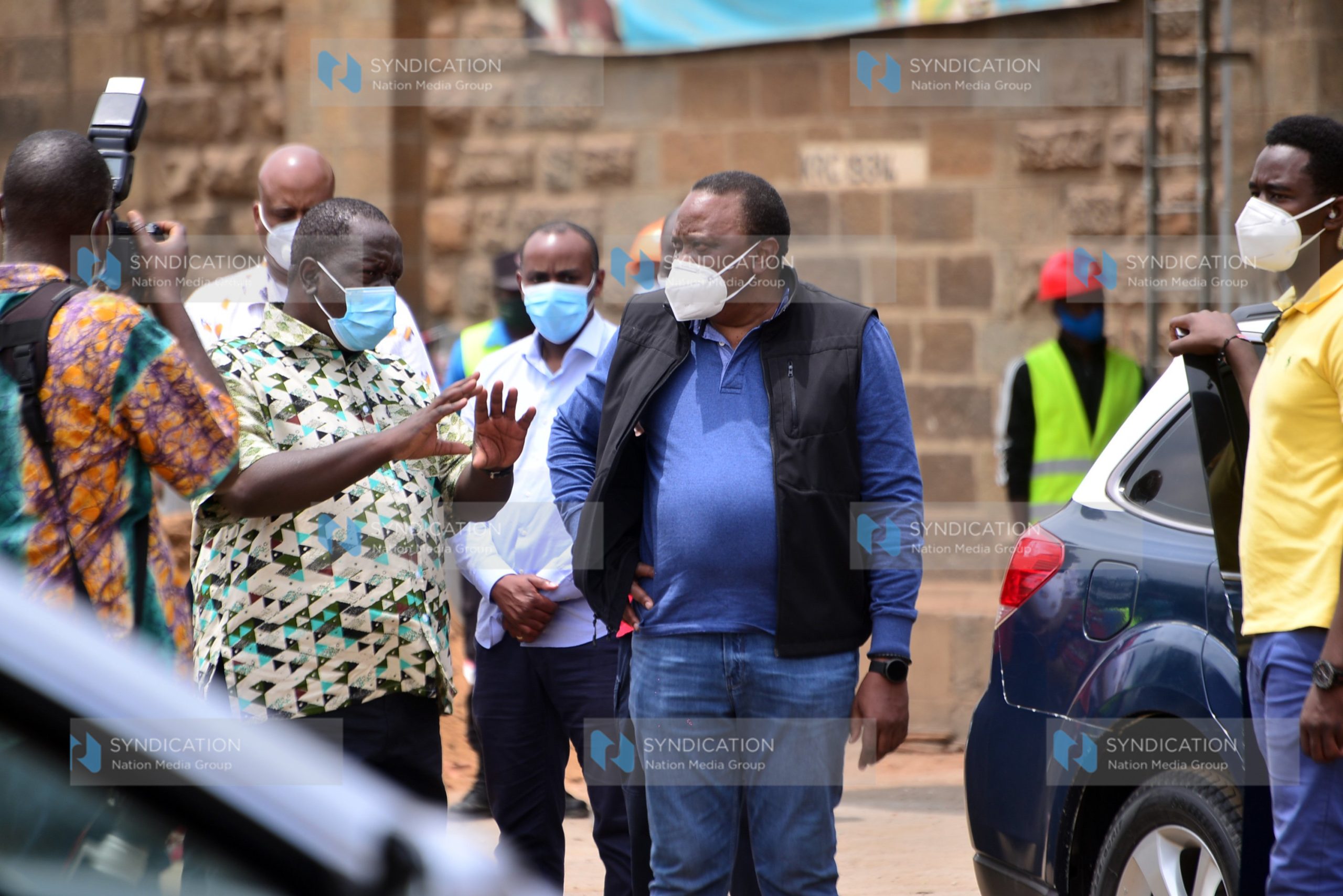 President Uhuru Kenyatta (right) accompanied by Interior CS Fred Matiang’I