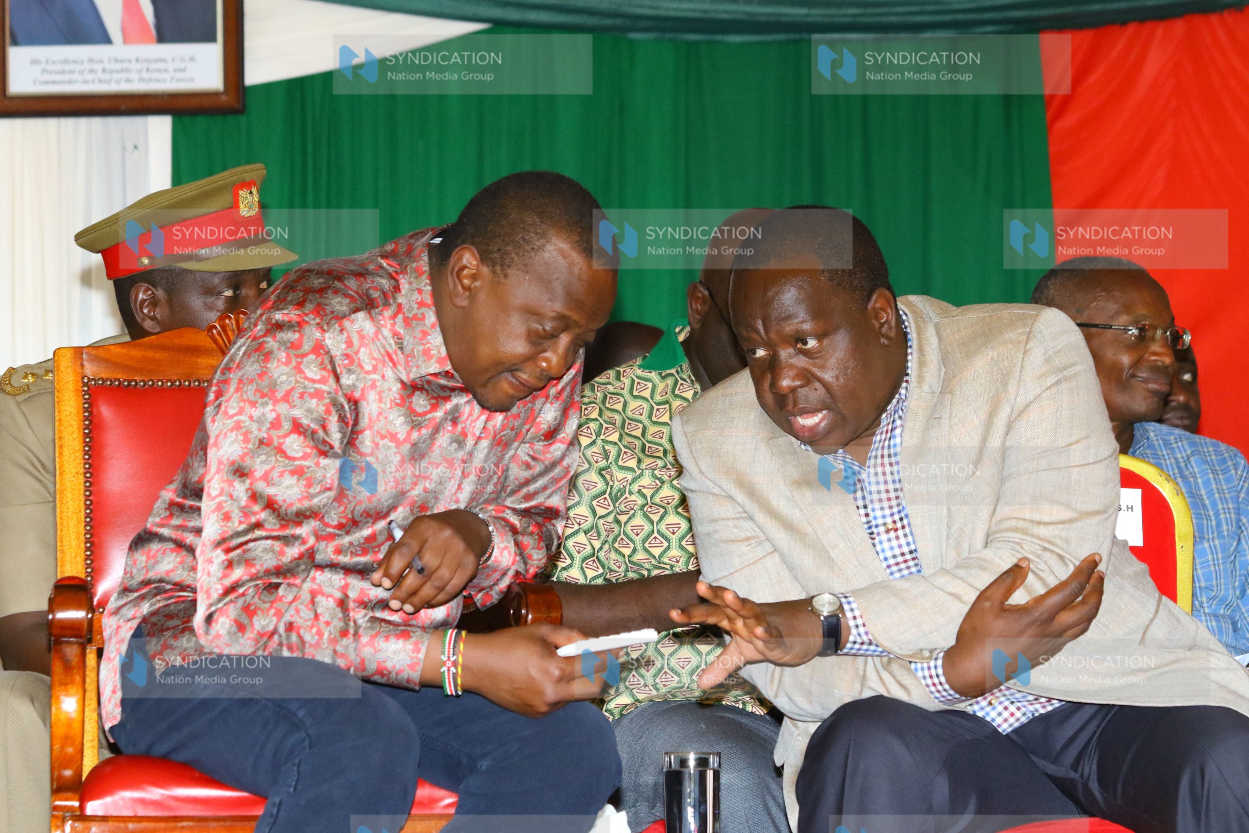 President Uhuru Kenyatta (Right) and Education CS Dr. Fred Matiang’i